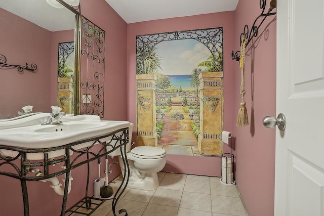 bathroom featuring tile patterned floors and toilet