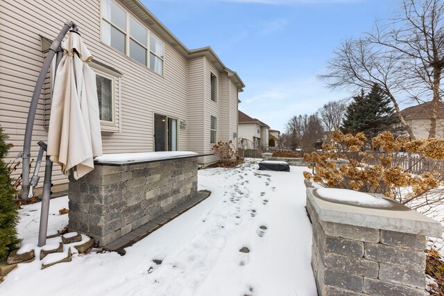 view of snow covered property