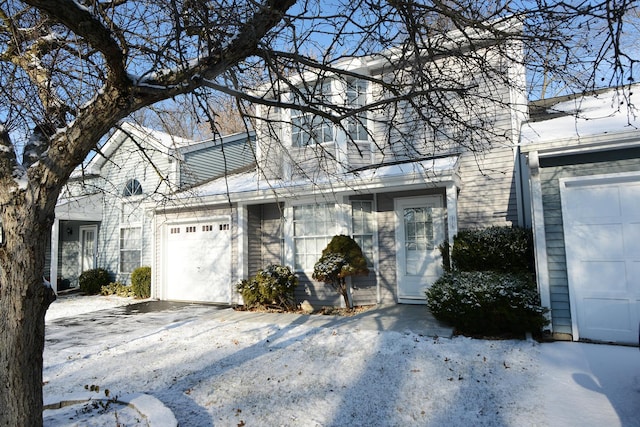 view of snow covered garage