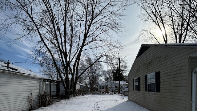 view of yard covered in snow