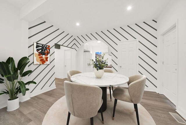 dining room featuring hardwood / wood-style flooring