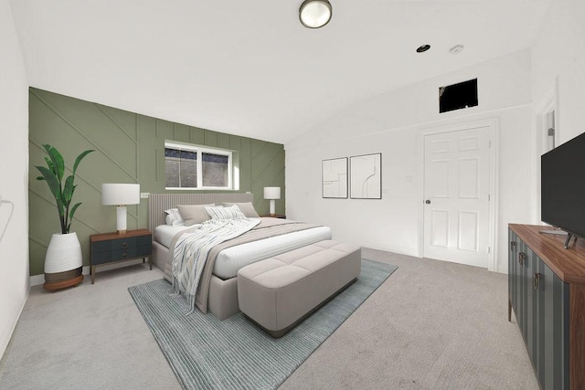 carpeted bedroom featuring lofted ceiling