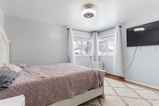 bedroom with light hardwood / wood-style floors