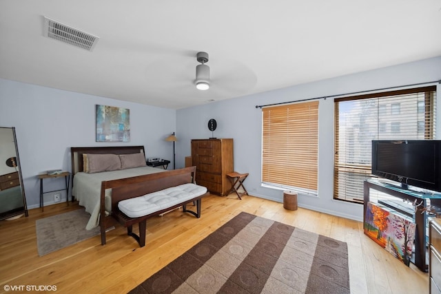 bedroom featuring ceiling fan and light hardwood / wood-style flooring