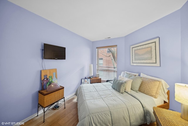 bedroom featuring hardwood / wood-style floors