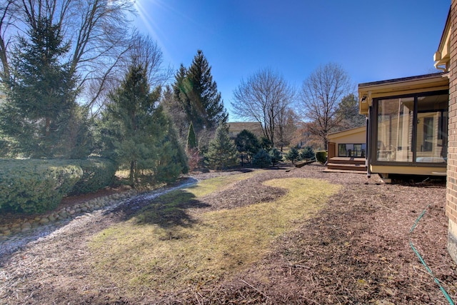 view of yard featuring a deck