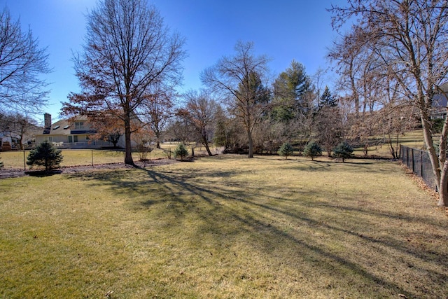 view of yard with fence