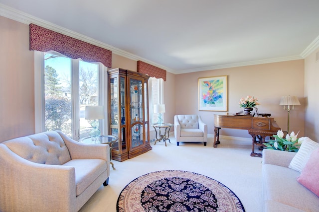 carpeted living room featuring baseboards and ornamental molding