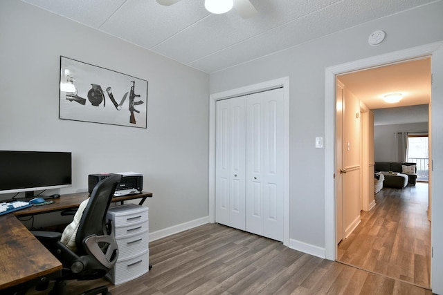 office area featuring ceiling fan and wood-type flooring