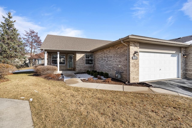 ranch-style home with a garage and a front yard