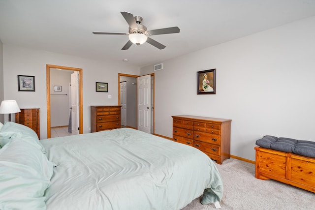 bedroom with light colored carpet and ceiling fan