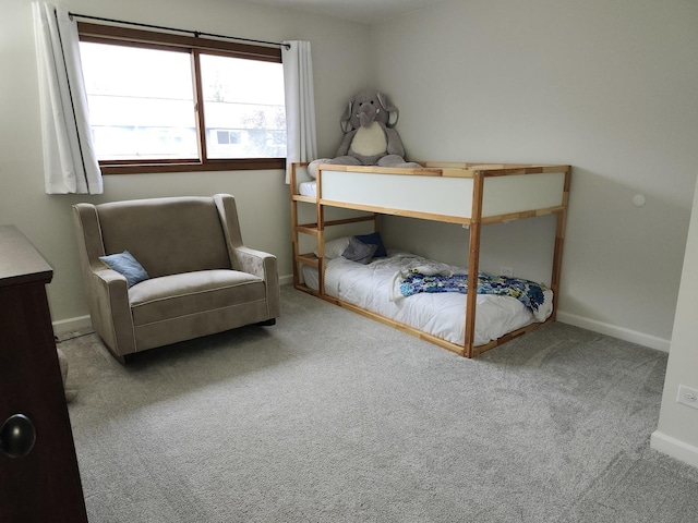 bedroom with light carpet