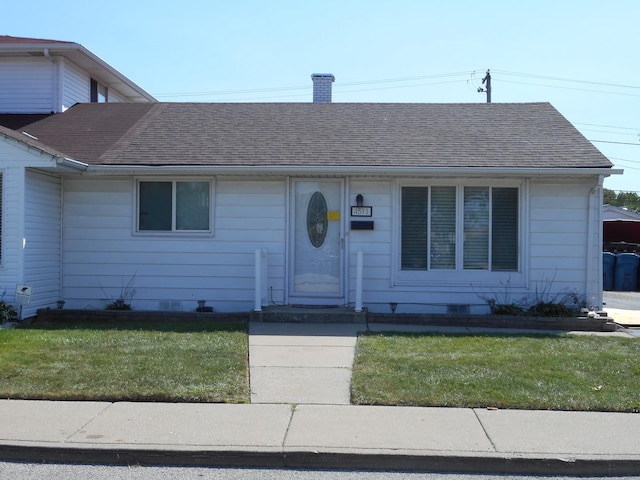 view of front of house with a front yard