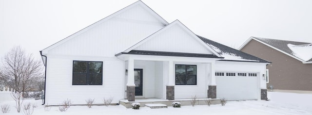 view of front of property featuring a garage