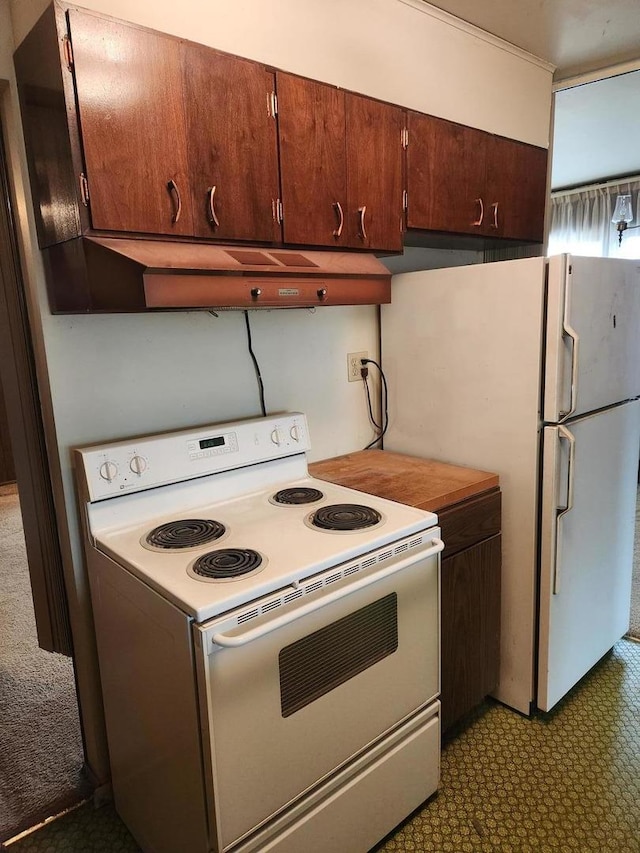 kitchen with white range with electric stovetop