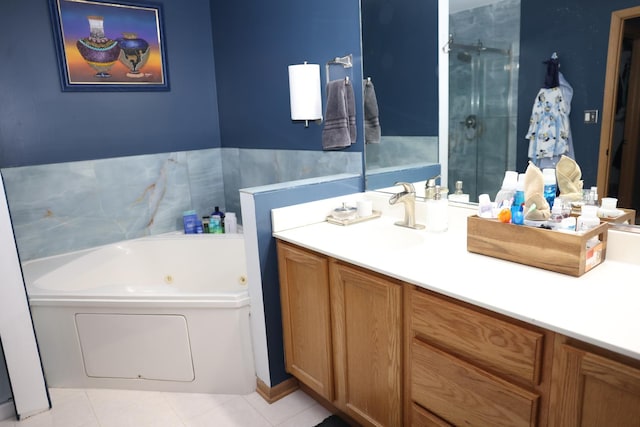 bathroom featuring independent shower and bath, vanity, and tile patterned floors