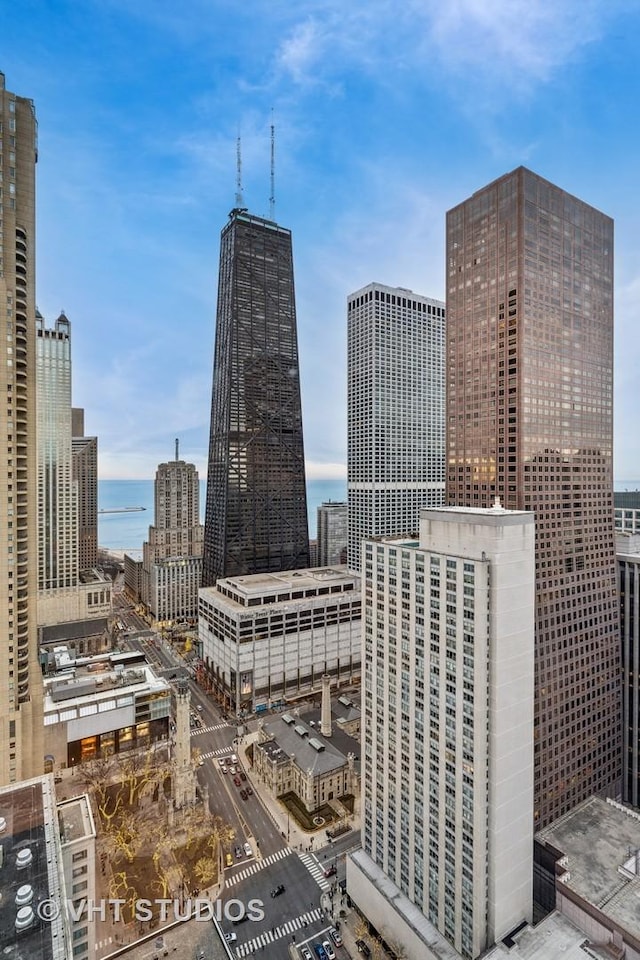 property's view of city with a water view