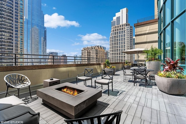 view of patio / terrace with a fire pit