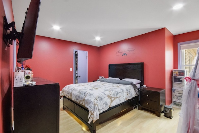 bedroom featuring light hardwood / wood-style floors