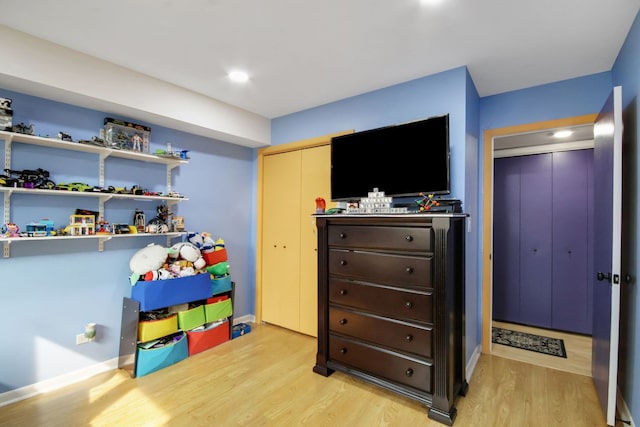 game room featuring light hardwood / wood-style floors