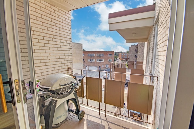 balcony featuring a grill