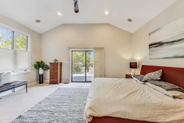 bedroom with access to outside, multiple windows, light carpet, and vaulted ceiling