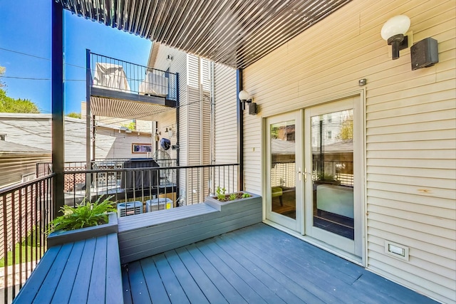 wooden deck with french doors