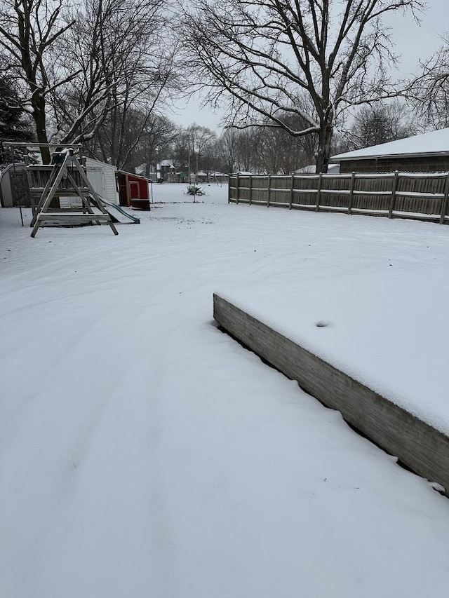 view of yard covered in snow