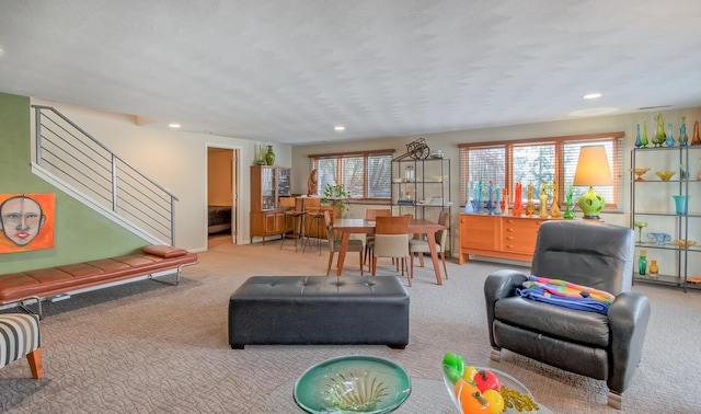 living room featuring light colored carpet