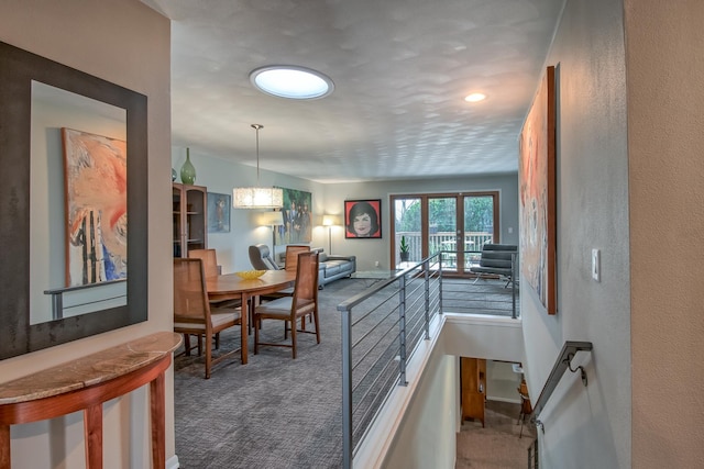 view of carpeted dining area