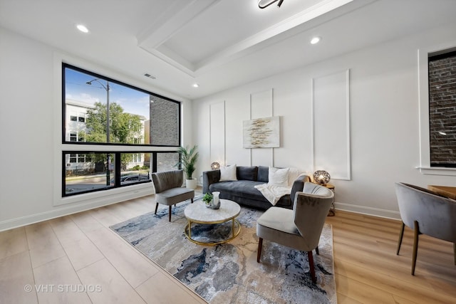 living room with light hardwood / wood-style flooring