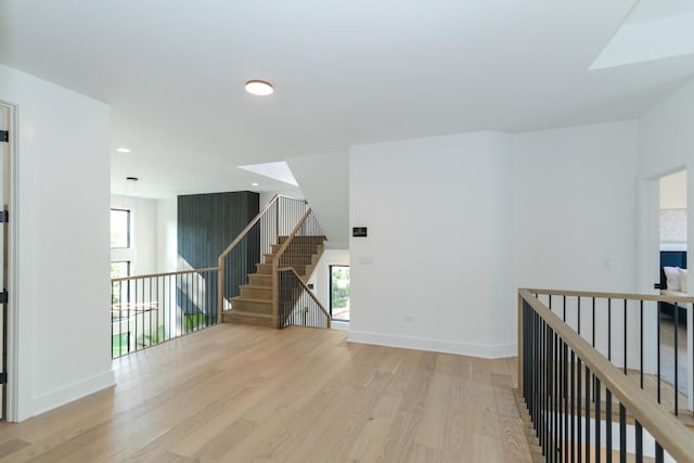 hallway with light wood-type flooring