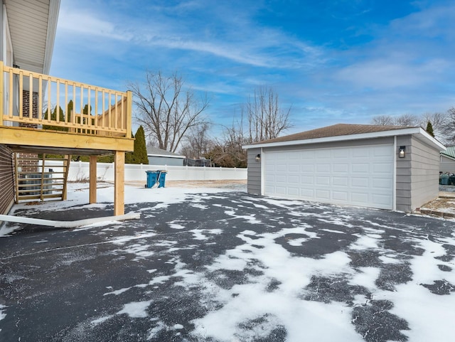 exterior space featuring an outdoor structure and a garage