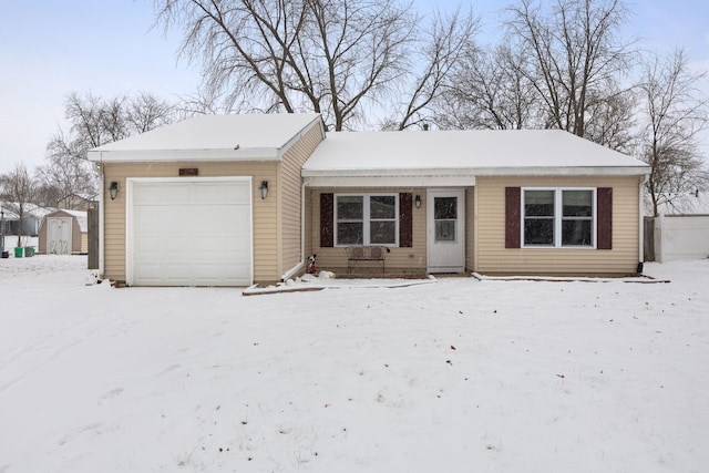 ranch-style house with a shed and a garage