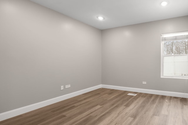 empty room with light wood-type flooring