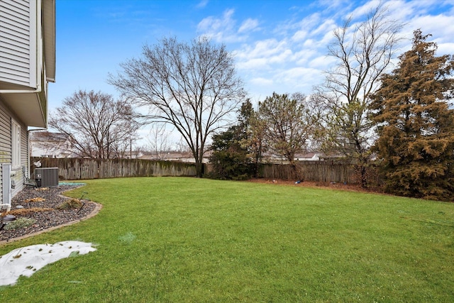 view of yard with central AC