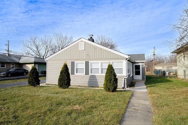 view of front of home with a front yard