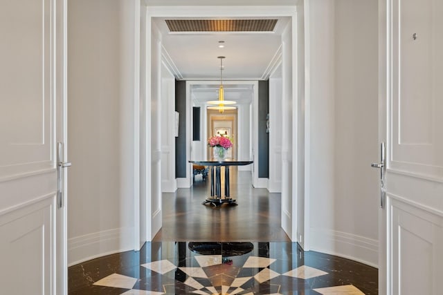 hallway with crown molding