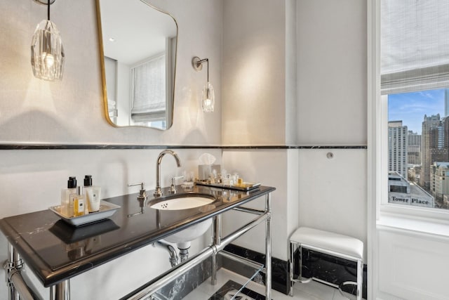 bathroom featuring tile patterned floors and sink