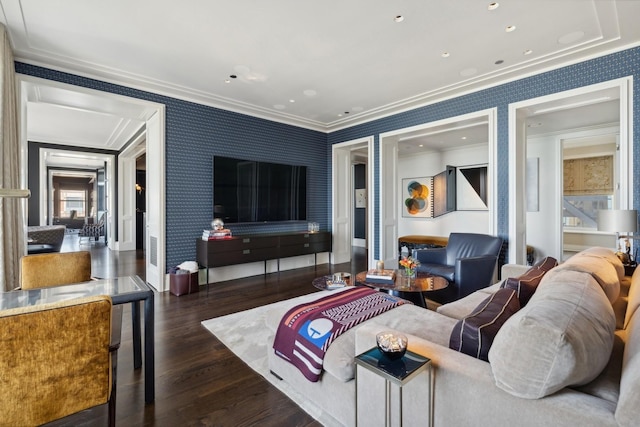 living room featuring dark hardwood / wood-style floors and ornamental molding