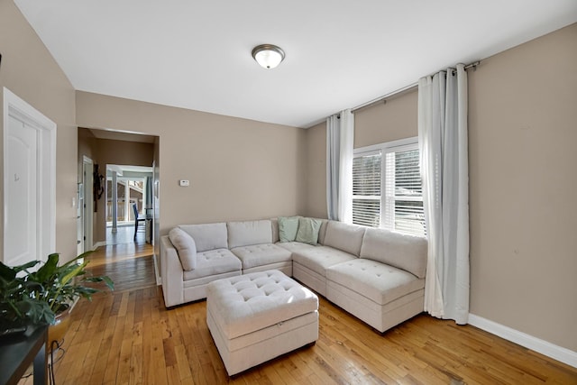 living room featuring light wood-type flooring