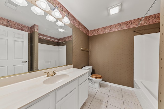 full bathroom featuring toilet, shower / tub combination, vanity, and tile patterned floors