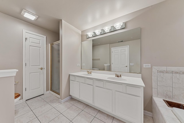 full bathroom with toilet, vanity, tile patterned floors, and plus walk in shower