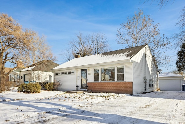 view of front of property featuring a garage