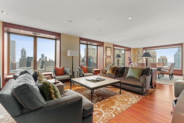 living room featuring light hardwood / wood-style floors and a wealth of natural light