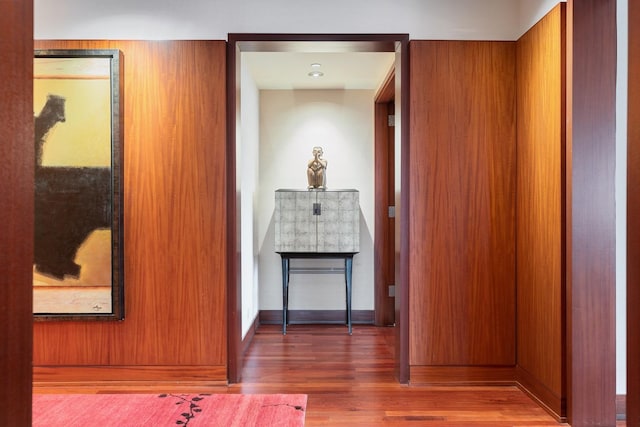 corridor featuring dark hardwood / wood-style floors