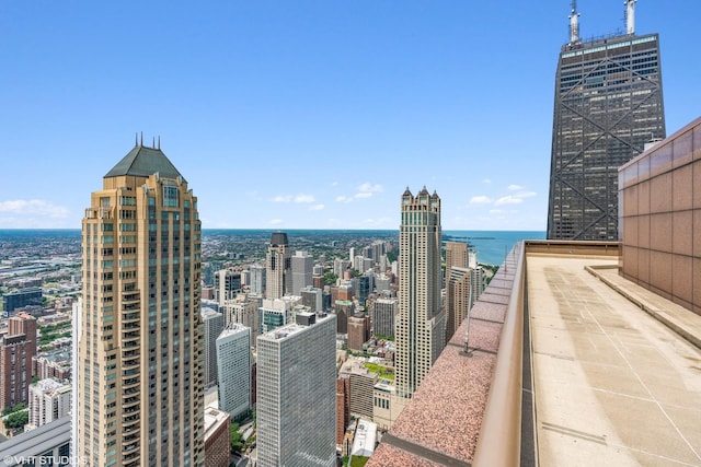 property's view of city featuring a water view