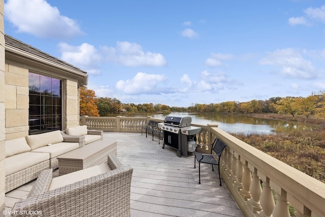 wooden terrace featuring an outdoor hangout area, a water view, and a grill