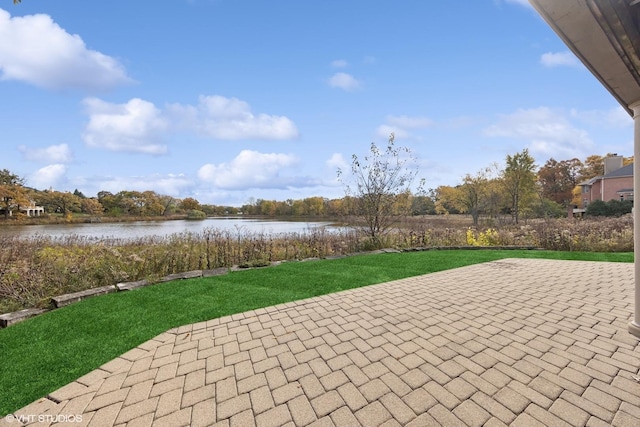 view of patio / terrace with a water view