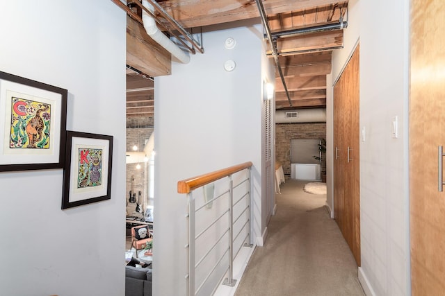 hallway with light carpet